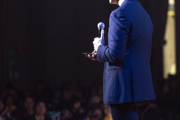 speaker on stage in a conference room